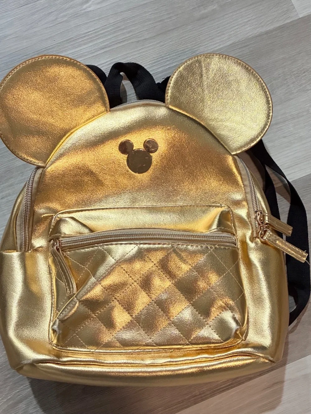 Gold Mickey Mouse mini backpack